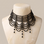 Rhinestone Cascade Collar in black — shown on display bust
