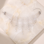 Rhinestone Cascade Collar in clear crystal — laid flat, showing clasp and extension chain