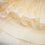 Elara Cream Pleated Gown