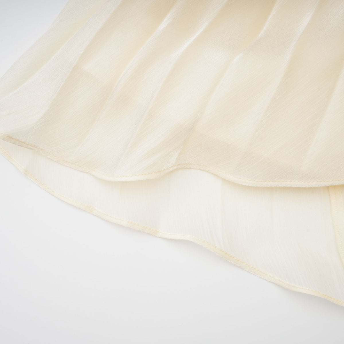 Elara Cream Pleated Gown