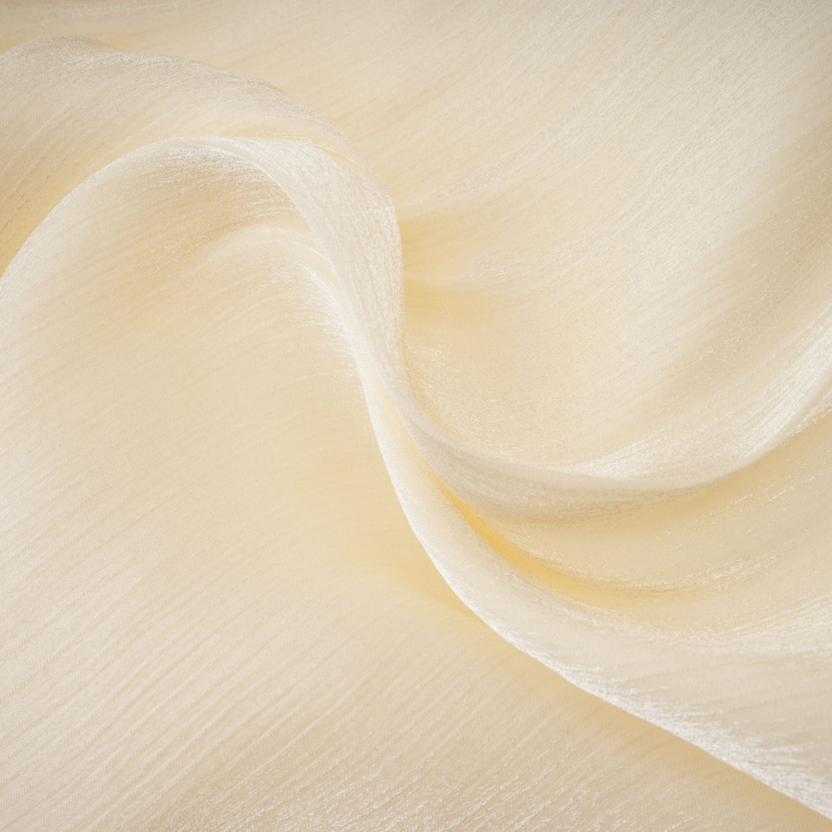 Elara Cream Pleated Gown